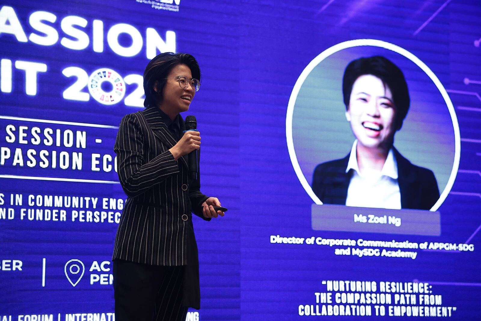 Zoel Ng speaking at an event